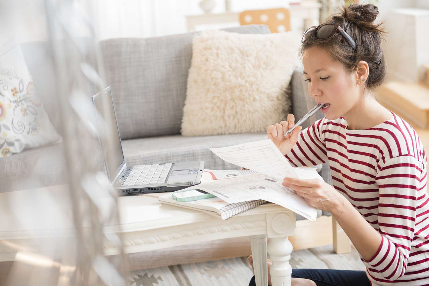 Woman Paying Bills on Laptop